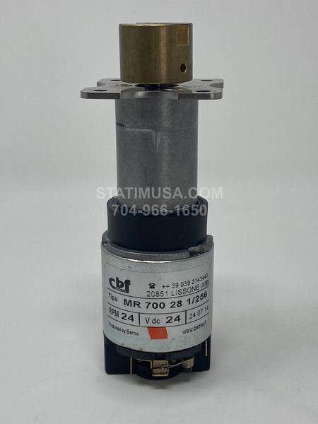 This is the front view of a Scican Bravo 17V door motor with bracket