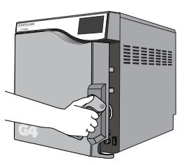 Opening the door on a Scican Statclave G4 chamber autoclave