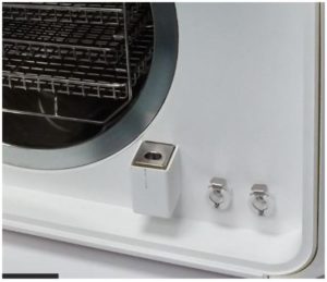 The location of the mineral-free and waste-water reservoirs on the Tuttnauer T-Edge Steam Sterilizer.