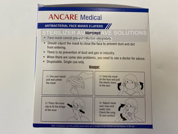 The right side view of a box of Ancare Medical surgical grade 3-ply antibacterial face masks