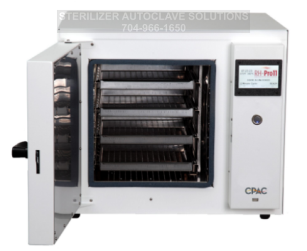 This is the front view of a CPAC RH-Pro11 heat sterilizer with the door open showing the trays and chamber.