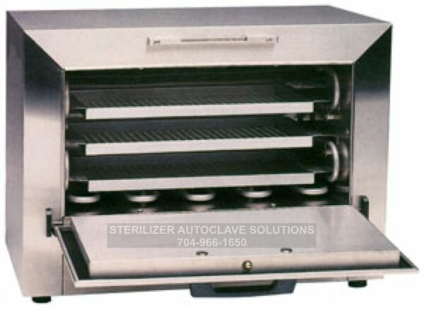 This is a SteriDent Static Heat Sterilizer Model #300 301000-SD with the door open showing the trays.